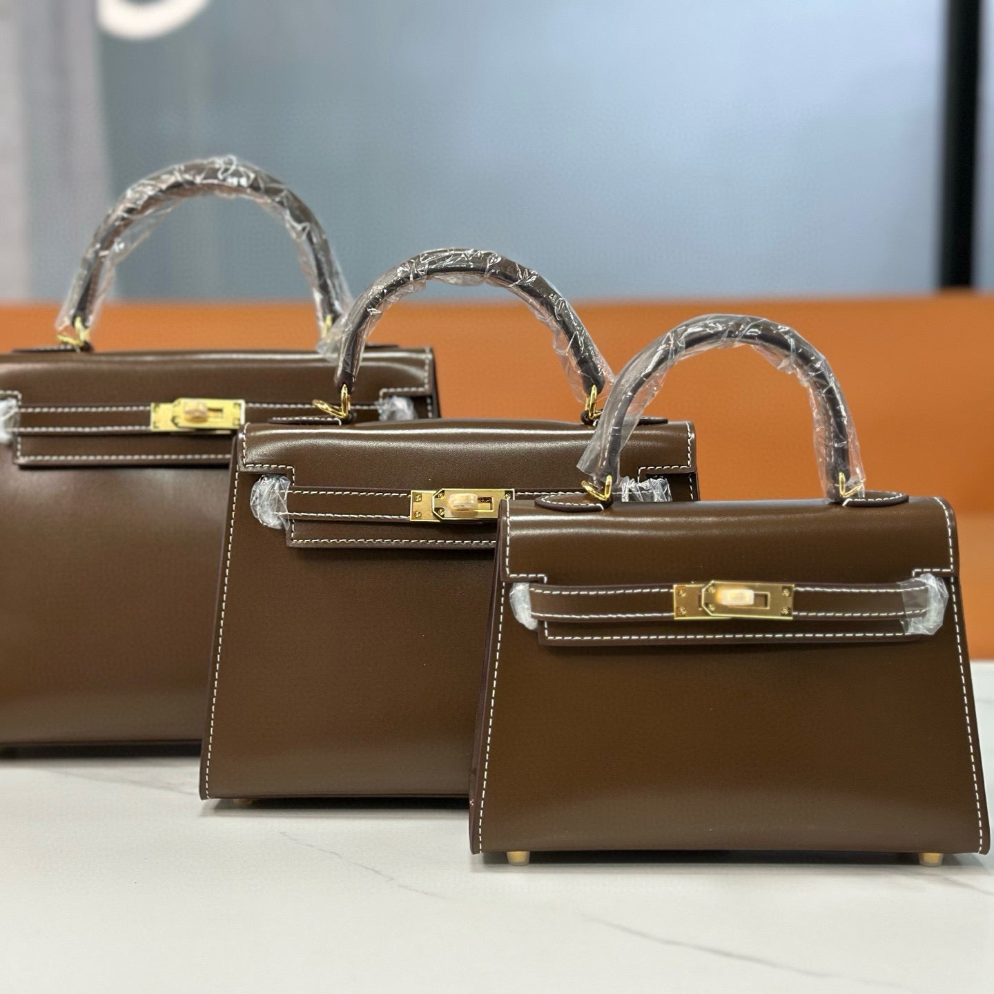 Bag Kelly taupe bright leather 19/22/25cm
