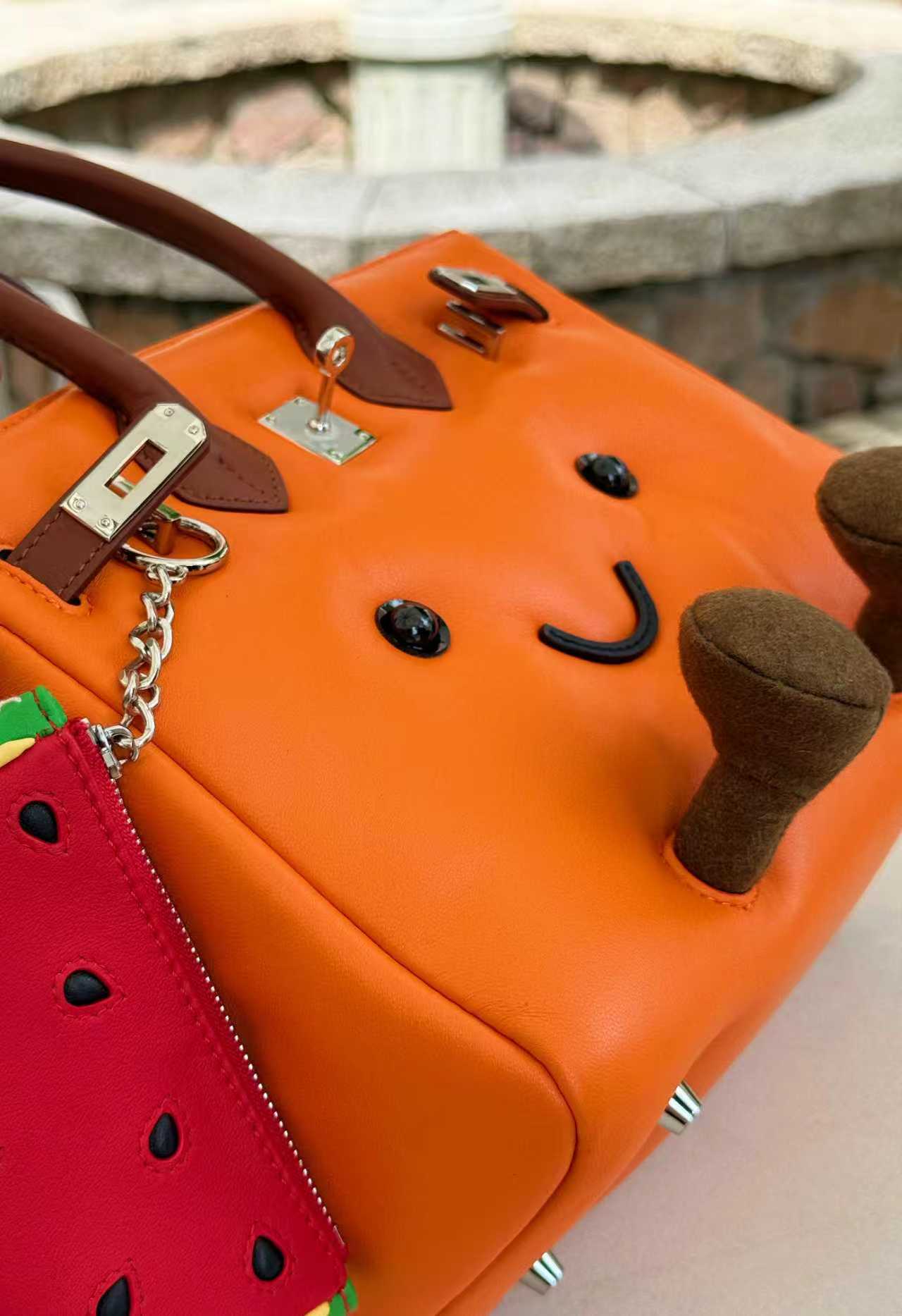 Classic leather Orange-colored handbag