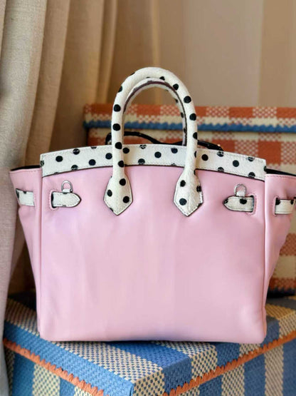 Classic leather point pink-colored handbag